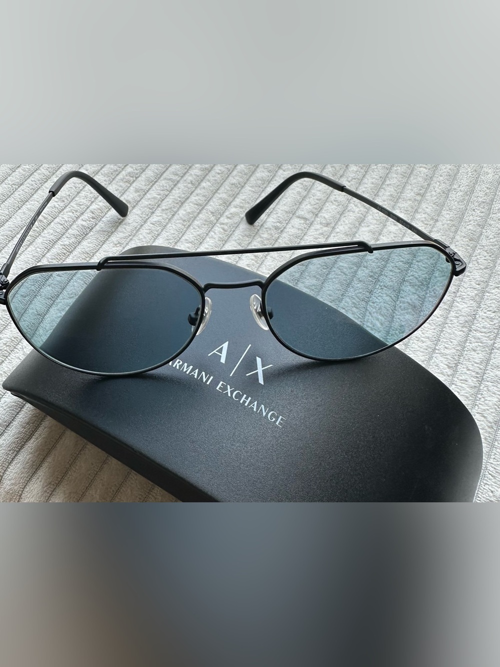 Armani Exchange Men's Black Metal Frame Sunglasses with Blue-Tinted Lenses